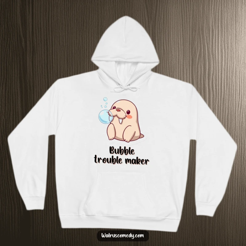 Funny kawaii walrus blowing a big bubble with its flippers, looking surprised and cozy in this warm hoodie.
