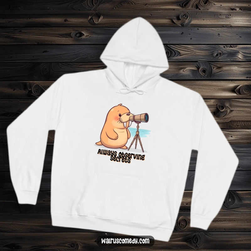 Funny walrus hoodie depicting a curious walrus intently peering through a telescope at the sea, radiating adventure.