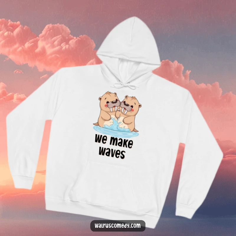 Funny walrus hoodie depicting siblings playfully splashing water, perfect for those who love water activities and humor.