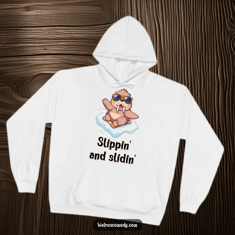 Funny kawaii walrus wearing sunglasses, speeding down an icy slope, bringing cool vibes and warmth in this hoodie.