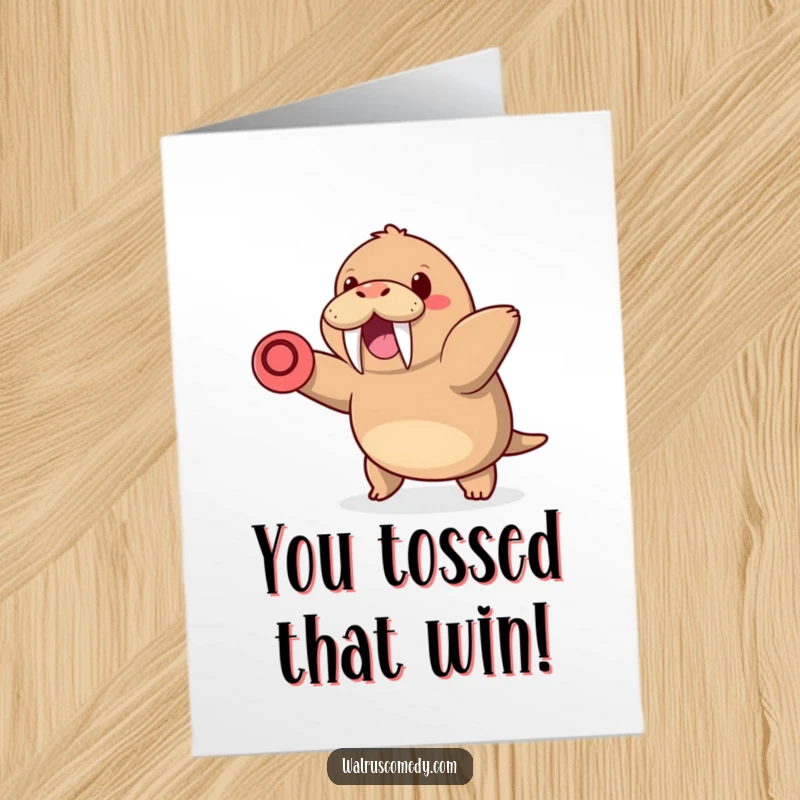 Fun Free Printable Congrats Card: Kawaii walrus with tusks happily throws a frisbee, celebrating achievement with a grin.