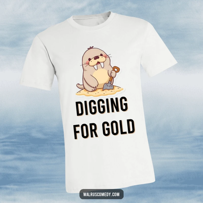 Funny T-Shirt: An energetic walrus character is happily digging in the sand with a small shovel, embodying beach playfulness.